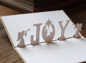 pop up white Christmas card made with laser cutting