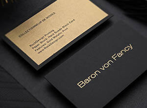 black business card with metallic gold ink
