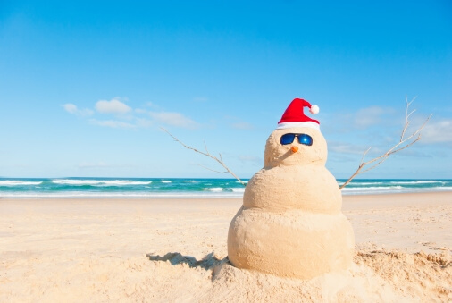 Christmas card with sand snowman
