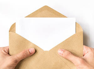 opening direct mail envelope